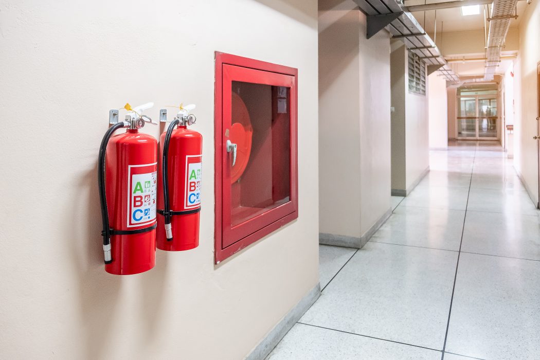 Fire extinguisher system on the wall background, powerful emerge Fire extinguisher